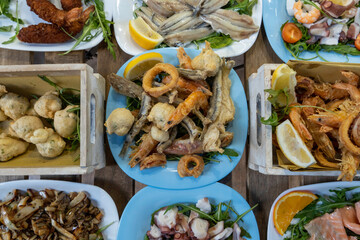 piatti di mare con prodotti ittici