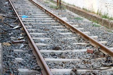Image of Railroad tracks near a train station