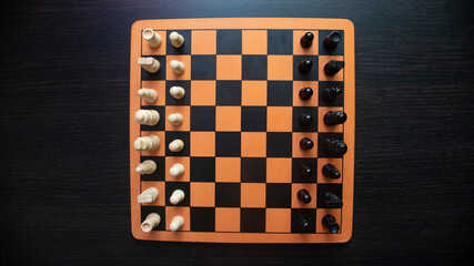 CHESS BOARD WITH PIECES READY TO START THE GAME LEADERSHIP CONCEPT