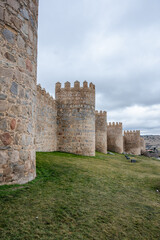 Fototapeta na wymiar City wall of Avila in Castilla y Leon, Spain. Wall from the end of the 11th century. World Heritage Site by UNESCO