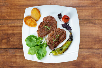 grilled beef fillet steak meat with rosemary. Biftek 