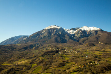 Naklejka na ściany i meble panorama of the Majella mountain in Abruzzo Italy in autumn with the snowy peak from the first snowfall