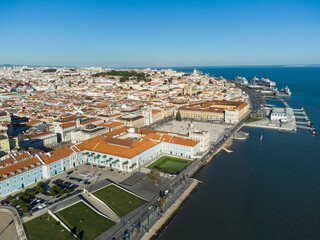 Aerial view of the famous Commerce square, the Pracia Do Comercio, along the Tagus river in Lisbon historical city center in Portugal with the ferry cruise ship terminal