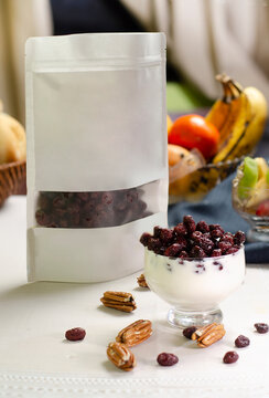 blueberries with fruits and yogurt glass nuts white doypack 
