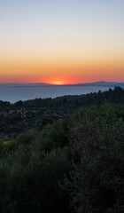Tranquil scene of beautiful sea at sunset. Orange and yellow sunset on the sea. Aerial panoramic view of sunset over sea.