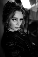 black and white portrait of a girl, expressive look, make-up. High quality photo