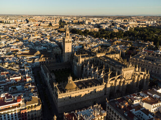 Dramatic aeria view of the Sevilla cathedral in Seville old town with it famous Giralda bell town in Andalucia in Spain