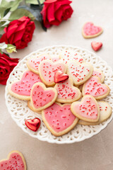 Heart cookies. Homemade butter cookies with pink glaze and sprinkles.