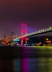 Fototapeta na wymiar ISTANBUL, TURKEY. Istanbul Bosphorus Bridge (15 July Martyrs Bridge. Turkish: 15 Temmuz Sehitler Koprusu). Beautiful Istanbul sunset.