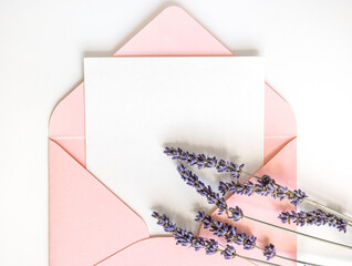Top view pink envelope with copy space and lavender