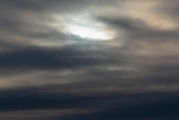 Obraz premium A dark cloud, a cloud covered the sun before hail, rain or snowfall.