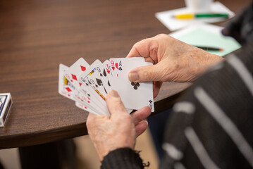 playing cards in the hand