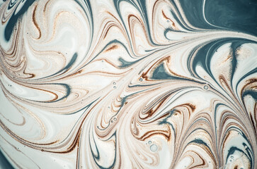 Marbleized effect. Natural Luxury. Liquid marble pattern with golden powder. Ancient oriental drawing technique.