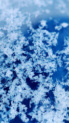 Obraz premium abstraction of white snow on a blue background 
