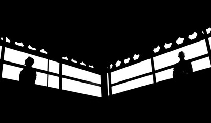Fototapeta premium silhouette of two people in black and white