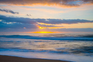 Obraz na płótnie Canvas Soft sunrise seascape with clouds