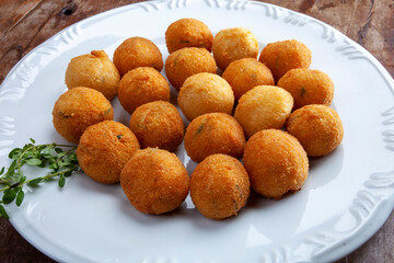 cod dumpling, salt cod fritters, bunuelos de bacalao. Brazilian snack 