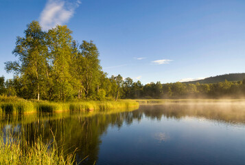 Fototapeta na wymiar Beautiful morning at lake Tevsjon near Ljusnedal