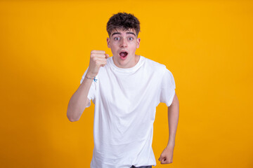 young teenager isolated on background running