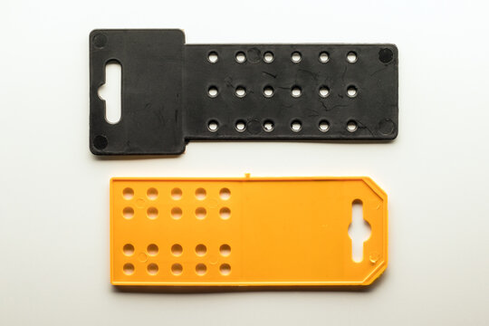 Yellow And Black Perforated Plastic Panels For Packaging With Hang Slot