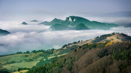 Mount Three Crowns (Trzy Korony) over a sea of clouds, seen from Mount Wysoka in the Pieniny National Park, Poland © Terefere