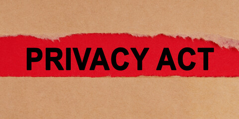 Among the torn sheets of paper on a red background, the inscription - PRIVACY ACT