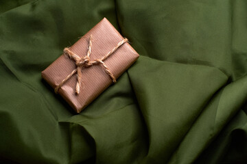 Gift package wrapped in kraft paper