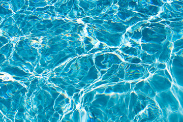Obraz premium Water in swimming pool, background with high resolution. Wave abstract or rippled water texture.