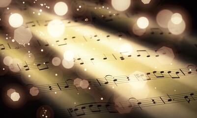 Old sheet with Christmas music notes as background bokeh