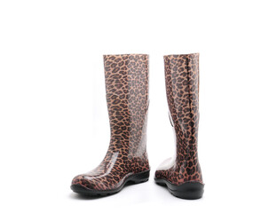 Women's rubber boots with leopard patterns on a white background