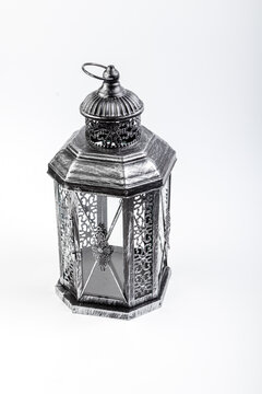 Beautiful vintage metal lantern on a white background