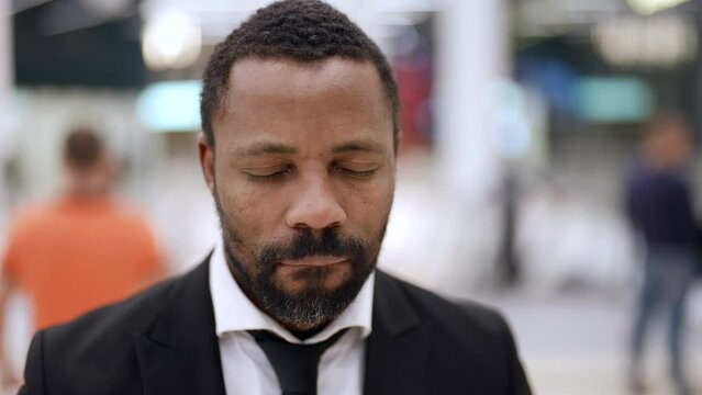 unhappy and frustrated black man, upset face expression, emotional portrait