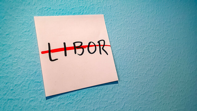 the word LIBOR, short for London Interbank Offered Rate, crossed with a red pen on a sticky note ahead of its discontinuation and replacemenr by SOFR and SONIA as risk-free rate