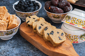 Kospa or jent - Kazakh traditional treat with raisins or nuts, usually made with flour of roasted barley or wheat. Very healthy food.