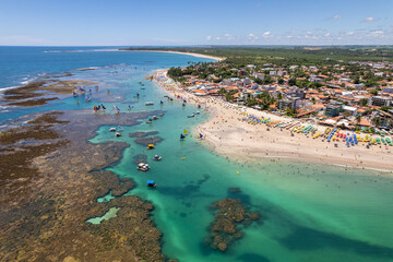 Aerial view of Porto de Galinhas beaches, Pernambuco, Brazil. Natural pools. Fantastic vacation travel. Great beach scene. © Nexa