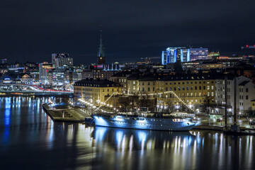 Fototapeta na wymiar Stockholm night skyline canal cityscape, Gamla Stan. Stockholm Sweden