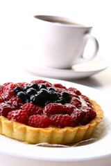 fresh fruitcake with blueberry and coffee cup