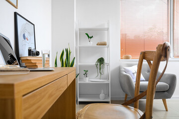Interior of light room with modern shelving unit