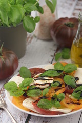 A plate with Italian salad caprese	