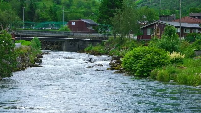 Norwegian landscape of a village with a river