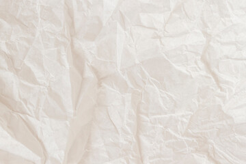 Crumpled paper texture, light cream color, background