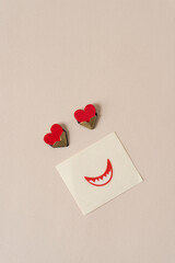 hearts, photo corners, sticker lips/smile on paper