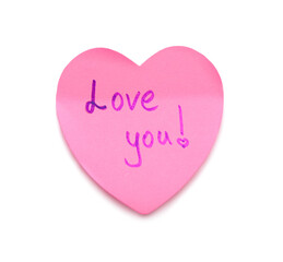 Heart shaped sticky note with text LOVE YOU on white background