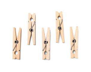 Wooden clothespins on white background