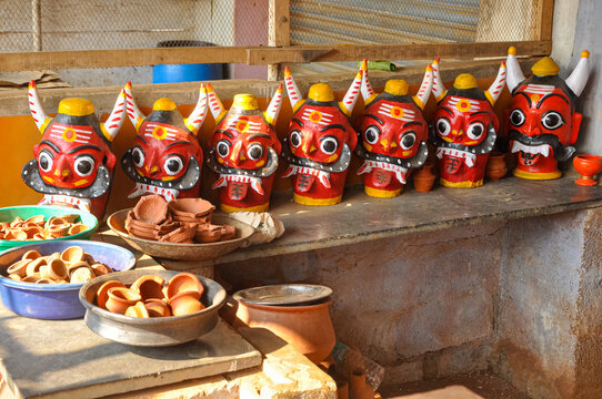 beautiful view of the stacked Drishti dolls (evil defender). Evil eye doll. clay carving. This Drishti bommai is used for preventing your house from any sort of bad things.