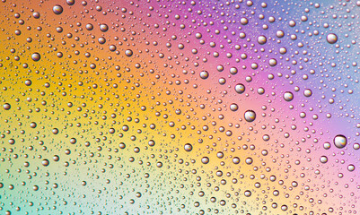Rainbow background of small droplets 