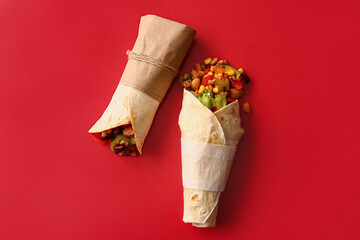 Delicious burritos on red background