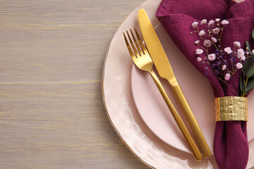 Stylish table setting on wooden background