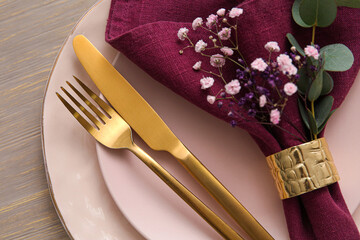 Stylish table setting on wooden background