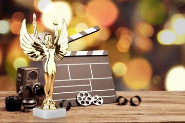 Golden film award with reel video tape